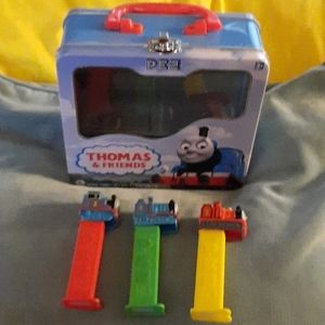 Thomas & Friends Collectible Pez holders (3) and tin "lunch" box.